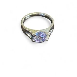 Elegant Silver Ring with Purple Gemstone